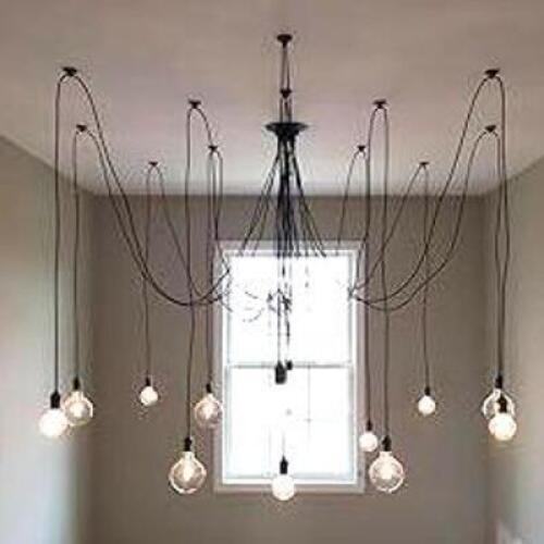 DESCRIPTION SWAG CHANDELIER - 14 PENDANT LIGHT UNIQUE MODERN CHANDELIER. RETAILS FOR $460 ADDITIONAL INFORMATION WINNING BIDDER MUST WIRE CAP AFTER RE
