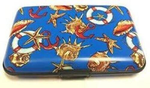 DESCRIPTION: (1) CASE OF APPROX (50) METAL WALLETS BRAND/MODEL: ARMORED WALLET INFORMATION: RED ANCHOR QTY: 1