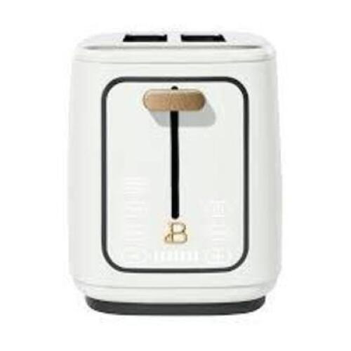 DESCRIPTION: (1) 2-SLICE TOASTER BRAND/MODEL: BEAUTIFUL INFORMATION: WHITE AND GOLD RETAIL$: $45.97 EA QTY: 1