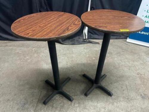 (2) 24" ROUND COMPOSITE TABLES W/ PUB BASES.