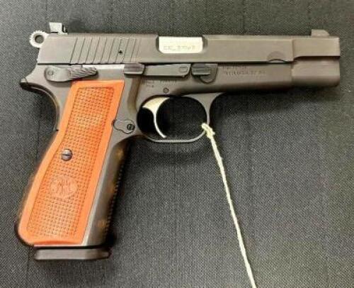 DESCRIPTION FN HIGH POWER 9mm LUGER PISTOL BRAND / MODEL: FN SERIAL # VU05276 ADDITIONAL INFORMATION COMES WITH CASE, BOX, AND (1) EXTRA MAG ADDITIONA