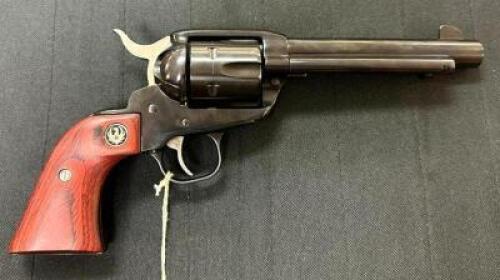 DESCRIPTION RUGER VAQUERO COLT 45 PISTOL BRAND / MODEL: RUGER SERIAL # 513-60238 ADDITIONAL INFORMATION ROSEWOOD GRIP, COMES WITH CASE ADDITIONAL INFO
