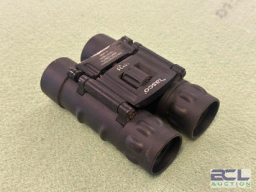 DESCRIPTION 10 X 25 BINOCULARS BRAND / MODEL: TASCO SIZE OPTICS COUNTER LOCATION ONE MONEY QTY 1