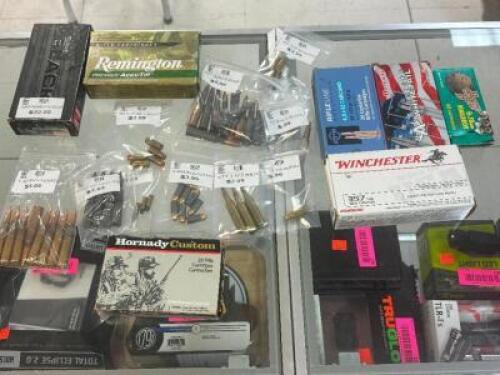 DESCRIPTION LARGE ASSORTMENT OF LOOSE AMMO / OPEN BOX SIZE OPTICS COUNTER LOCATION ONE MONEY QTY 1