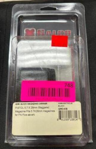 DESCRIPTION QMC QUICK MAGAZINE CARRIER BRAND / MODEL: QMC40B ADDITIONAL INFORMATION RETAILS FOR $61.99 LOCATION GUN COUNTER QTY 1