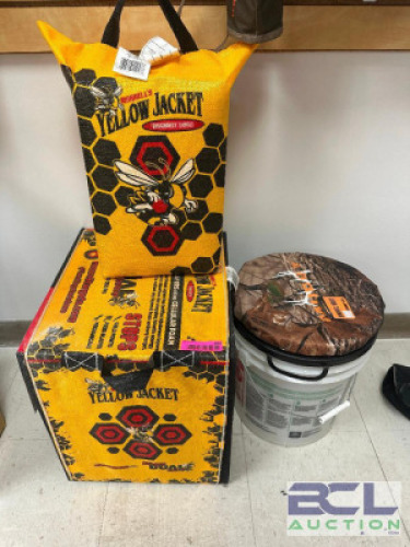 DESCRIPTION (2) YELLOW JACKET ARROW TARGETS AND (1) BUCKET SEAT COVER. THIS LOT IS: ONE MONEY LOCATION KNIFE COUNTER QTY 1