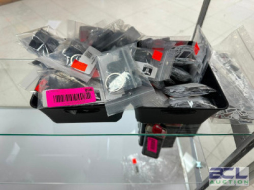 DESCRIPTION (1) LOT OF KEY CHAINE AND AINME GUN GIRL STICKERS. LOCATION KNIFE COUNTER QTY 1