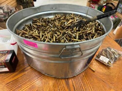 DESCRIPTION BUCKET AND CONTENTS - BRASS SHELL CASINGS LOCATION MIDDLE FLOOR QTY 1
