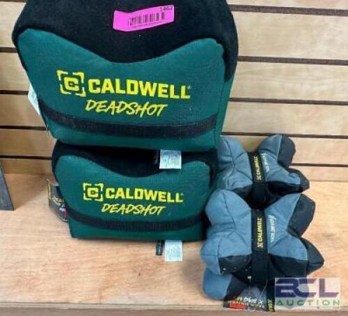 DESCRIPTION (4) ASSORTED CALDWELLS BEAN BAG RESTS. THIS LOT IS: ONE MONEY LOCATION GUN COUNTER QTY 1