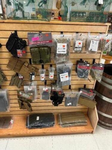 DESCRIPTION (1) LOT OF ASSORTED MILITARY SURPLUS GEAR, PONCHO, BAGS, AND STRAPS. THIS LOT IS: ONE MONEY LOCATION MIDDLE FLOOR QTY 1