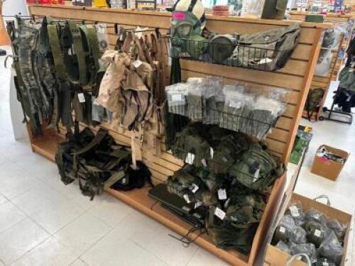 DESCRIPTION CONTENTS OF SHELF - ASSORTED MILITARY SURPLUS GEAR, VEST, BAGS, AND STRAPS. THIS LOT IS: ONE MONEY LOCATION MIDDLE FLOOR QTY 1