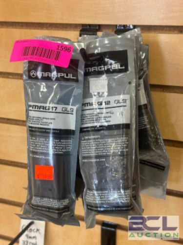 DESCRIPTION (11) - ASSORTED MAGAZINES BRAND / MODEL: MAGPUL ADDITIONAL INFORMATION SEE PHOTOS FOR CLOSE UP OF LOT CONTENTS. SIZE MAGAZINE WALL LOCATIO