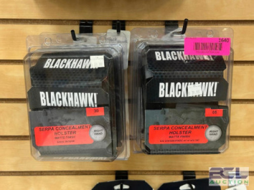 DESCRIPTION (4) - ASSORTED HOLSTERS BRAND / MODEL: BLACKHAWK ADDITIONAL INFORMATION SEE PHOTOS FOR CLOSE UP OF LOT CONTENTS. LOCATION SOLD BY THE PIEC