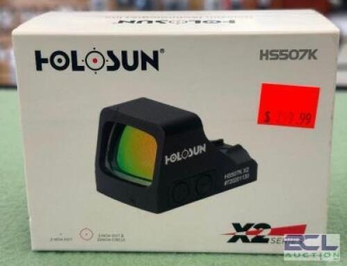 DESCRIPTION RED DOT ENCLOSED PISTOL SIGHT BRAND / MODEL: HOLOSUN ADDITIONAL INFORMATION NEW IN BOX. SIZE OPTICS COUNTER LOCATION ONE MONEY QTY 1