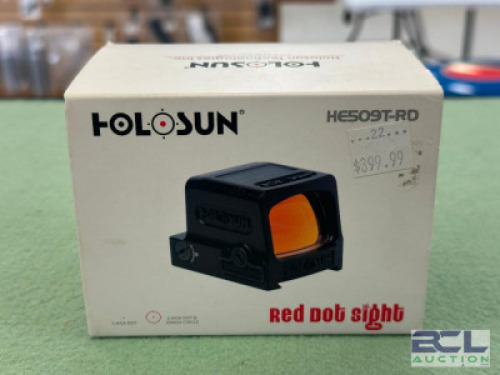 DESCRIPTION RED DOT ENCLOSED PISTOL SIGHT BRAND / MODEL: HOLOSUN SIZE OPTICS COUNTER LOCATION ONE MONEY QTY 1