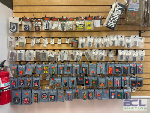 DESCRIPTION COMPLETE PATCH RETAIL SECTION WITH PATCHES, WALL HOOKS AND ALL CONTENTS ADDITIONAL INFORMATION ALL CONTENTS OF PATCH RETAIL AREA. HARDWARE