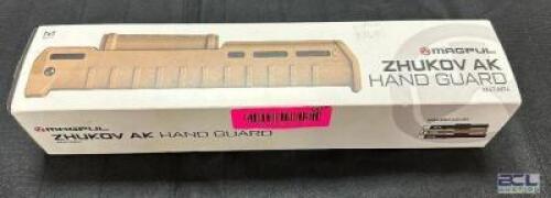DESCRIPTION MAGPUL ZHUKOV AK HAND GUARD ( TAN ) BRAND / MODEL: MAGP868 ADDITIONAL INFORMATION RETAILS FOR $97.99 LOCATION GUN COUNTER QTY 1