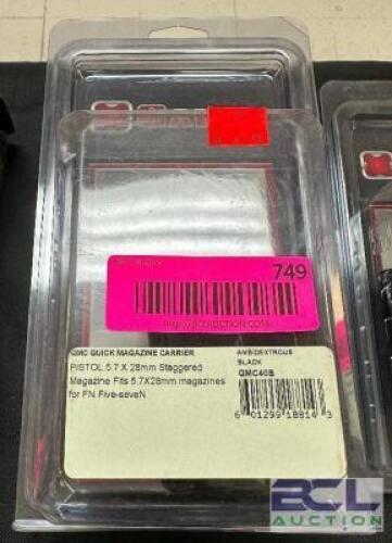 DESCRIPTION QMC QUICK MAGAZINE CARRIER BRAND / MODEL: QMC40B ADDITIONAL INFORMATION RETAILS FOR $61.99 LOCATION GUN COUNTER QTY 1