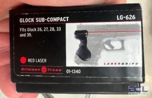 DESCRIPTION GLOCK SUB COMPACT RED LASER. BRAND / MODEL: LG-626 ADDITIONAL INFORMATION RETAILS FOR $202 LOCATION KNIFE COUNTER QTY 1