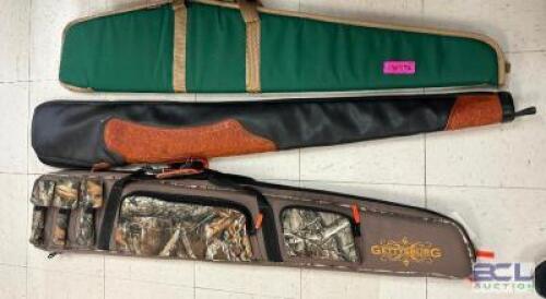 DESCRIPTION (3) ASSORTED CANVAS SHOTGUN / RIFLE CASES. THIS LOT IS: SOLD BY THE PIECE LOCATION KNIFE COUNTER QTY 3
