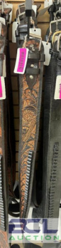 DESCRIPTION (4) GENUINE LEATHER WESTERN BELTS ADDITIONAL INFORMATION RETAIL EACH FOR $54 THIS LOT IS: SOLD BY THE PIECE LOCATION SOUTH WALL QTY 4