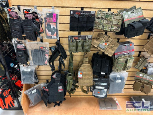 DESCRIPTION (1) LOT OF ASSORTED MILITARY SURPLUS GEAR, PONCHO, BAGS, AND STRAPS. THIS LOT IS: ONE MONEY LOCATION MIDDLE FLOOR QTY 1