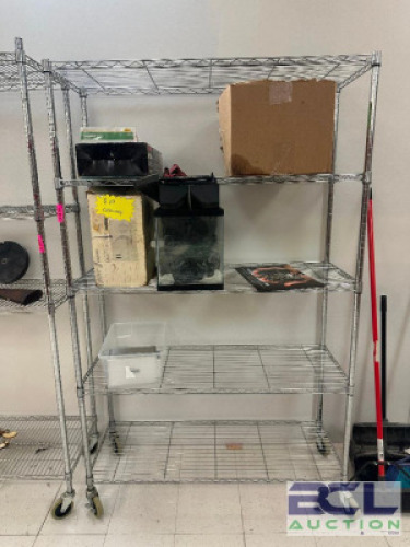 DESCRIPTION ROLLING SHELVING UNIT ADDITIONAL INFORMATION CONTENTS NOT INCLUDED. LAST DAY PICK UP ONLY. THIS LOT IS: 47" X 18" X 77" SIZE BACK ROOM LOC