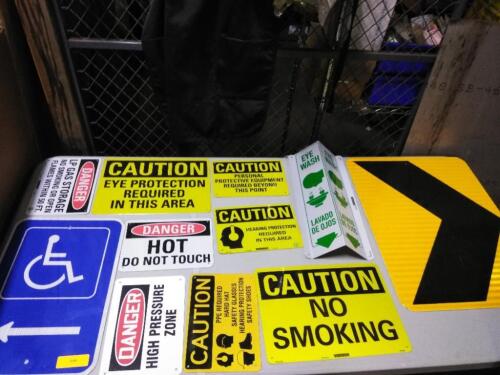 DESCRIPTION: (1) TABLE OF VARIOUS SIGNS QTY: 1