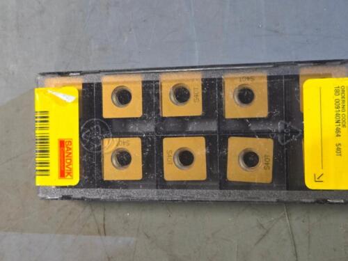 DESCRIPTION: (30) CARBIDE MODULMILL INSERTS BRAND/MODEL: SANDVIK COROMANT 180_009140N1464 S40T RETAIL$: 628.5 QTY: 30