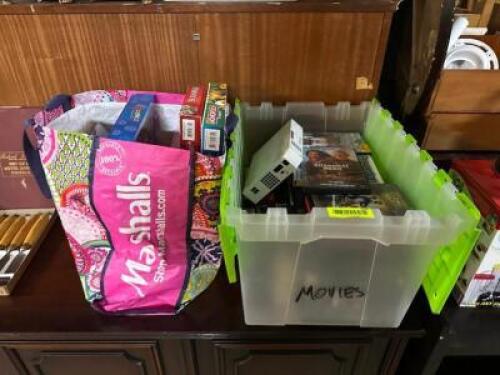 BAG AND CONTAINER WITH ASSORTED BOARD GAMES, VIDEO GAMES, AND DVD