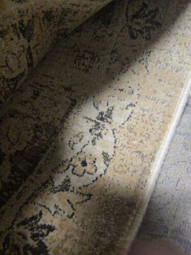 DESCRIPTION: (1) AREA RUG INFORMATION: MUST COME INSPECT, TAN AND BLACK SIZE: LARGE QTY: 1