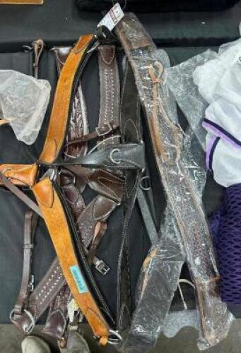 ASSORTED LEATHER BREAST COLLARS AND SADDLE BELTS