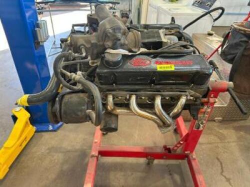 FORD SMALL BLOCK V8 ENGINE MOUNTED ON AN ENGINE STAND