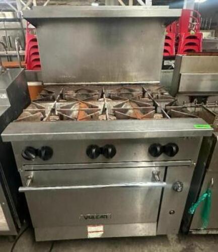 VULCAN SIX BURNER RANGE W/ LOWER OVEN.