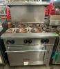 VULCAN SIX BURNER RANGE W/ LOWER OVEN.