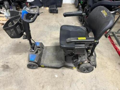 POWERED WHEEL CHAIR / SCOOTER.