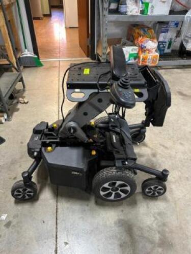 POWERED WHEEL CHAIR / SCOOTER.