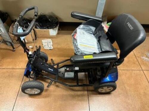 POWERED WHEEL CHAIR / SCOOTER.