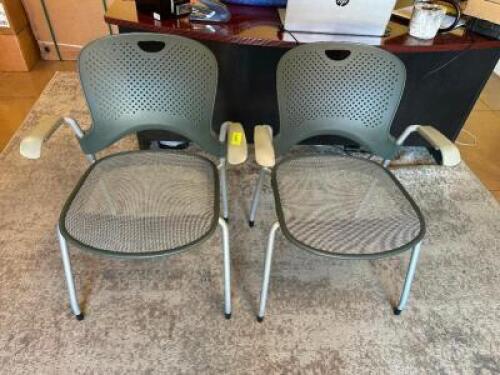 (2) PLASTIC ARM CHAIRS W/ METAL LEGS
