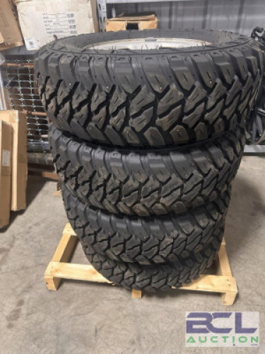 (4) - STUDDED TIRES FOR GM