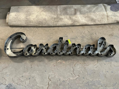 METAL CARDINALS SIGN