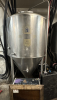 575-GALLON STAINLESS STEEL CONICAL FERMENTER WITH TOP MANWAY, RACKING ARM, SAMPLE VALVE, AND CONE DUMP. UNIT INCLUDES WELDED TRI-CLAMP FITTINGS, PRESSURE GAUGE, AND HEAVY-DUTY FRAME.
