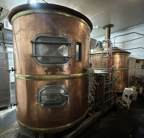 BOHEMIAN-STYLE COPPER-CLAD BREWHOUSE SYSTEM FEATURING MASH/LAUTER TUN, BOIL KETTLE, AND HOT LIQUOR TANK. INCLUDES STAINLESS VALVE MANIFOLD, PLATE HEAT EXCHANGER, AND CONTROL PANELS.