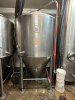 575-GALLON STAINLESS STEEL CONICAL FERMENTER WITH TOP MANWAY, RACKING ARM, SAMPLE VALVE, AND CONE DUMP. UNIT INCLUDES WELDED TRI-CLAMP FITTINGS, PRESSURE GAUGE, AND HEAVY-DUTY FRAME.