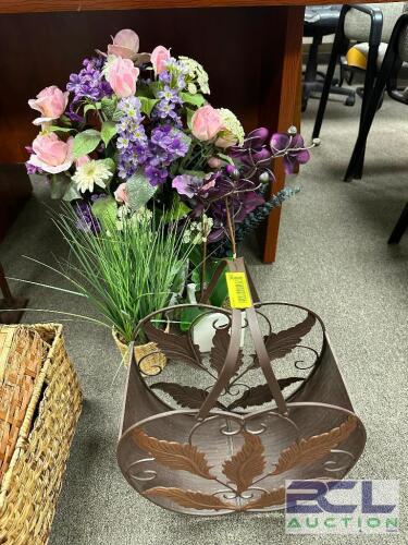 METAL MAGAZINE BASKET AND FLORAL ARRANGEMENT.