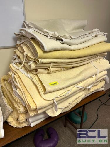 (1) LOT OF FLEECE PADS TO COVER MASSAGE THERAPY TABLES