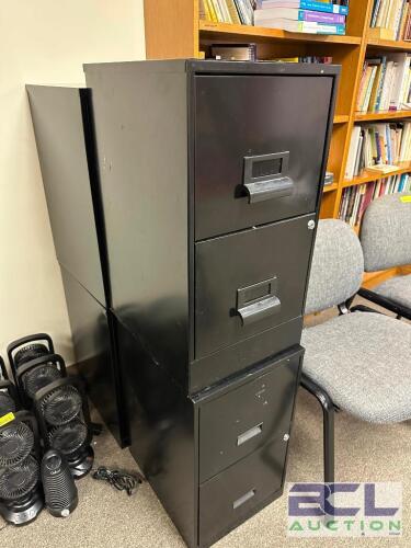 (2) FOUR DRAWER METAL FILE CABINETS.