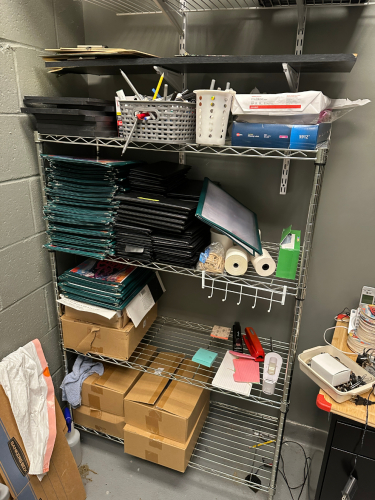 SHELF AND CONTENTS - MENU COVERS, AND MISC OFFICE SUPPLIES.