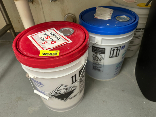 (2) PARTIAL BUCKETS OF DETERGENT.
