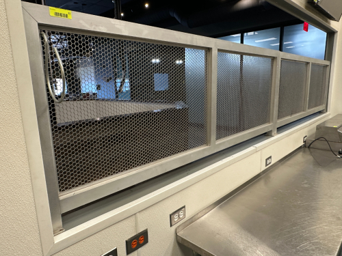 12' X 25" METAL AND MESH SCREEN PARTITION.
